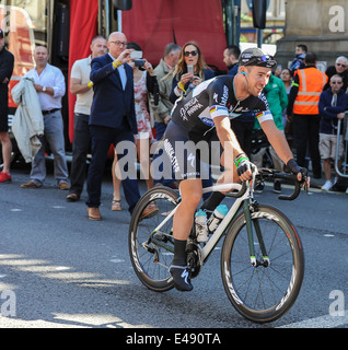 Mark Cavendish heading down to the start line on the Headrow in Leeds for the start of the Tour de France 2014 Stock Photo