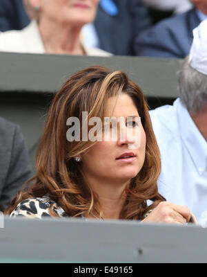 London, London, UK. 6th July, 2014. Mirka Federer watches the men's singles final match between her husband Roger Federer of Switzerland and Serbia's Novak Djokovic at the 2014 Wimbledon Championships in Wimbledon, southwest London, on July 6, 2014. Credit:  Meng Yongmin/Xinhua/Alamy Live News Stock Photo