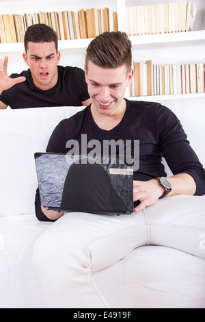 should not do anything behind someone's back, without the knowledge of friends or other people, secrets in computer Stock Photo