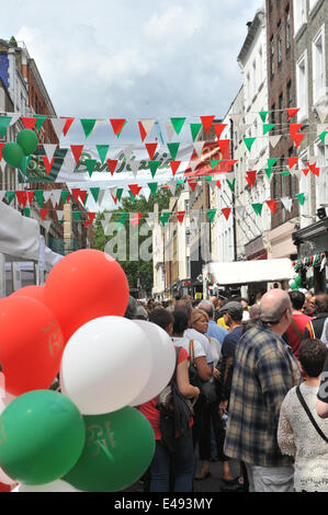 Frith Street, London, UK. 6th July 2014. Bar Italia celebrates its 65th birthday with Italian colours, scooters, food stalls and entertainment. Credit:  Matthew Chattle/Alamy Live News Stock Photo