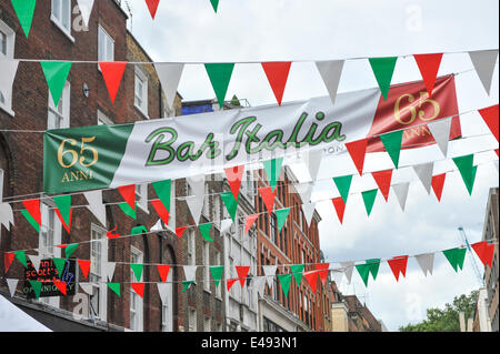 Frith Street, London, UK. 6th July 2014. Bar Italia celebrates its 65th birthday with Italian colours, scooters, food stalls and entertainment. Credit:  Matthew Chattle/Alamy Live News Stock Photo