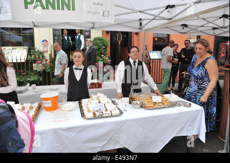 Frith Street, London, UK. 6th July 2014. Bar Italia celebrates its 65th birthday with Italian colours, scooters, food stalls and entertainment. Credit:  Matthew Chattle/Alamy Live News Stock Photo