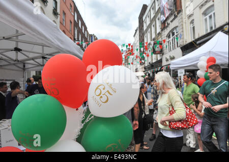 Frith Street, London, UK. 6th July 2014. Bar Italia celebrates its 65th birthday with Italian colours, scooters, food stalls and entertainment. Credit:  Matthew Chattle/Alamy Live News Stock Photo