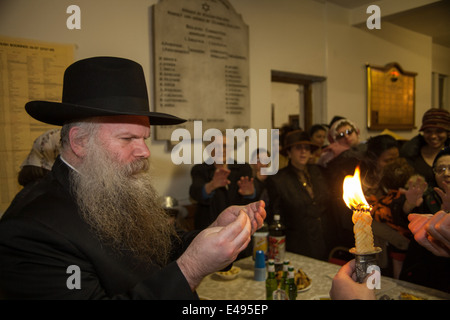 Rabbi concludes The Sabbath during The Jewish festival of Purim Stock