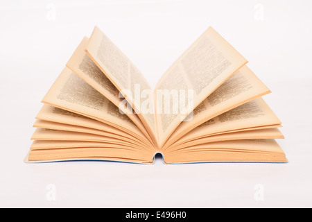 Old open book on white background Stock Photo