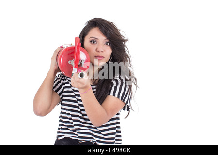 latin girl holding fire extinguisher Stock Photo
