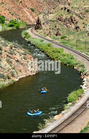 White water rafting on Arkansas River; railroad tracks, Canon City, Colorado USA Stock Photo