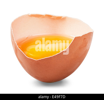 broken egg with yolk isolated on white background. Clipping Path Stock Photo