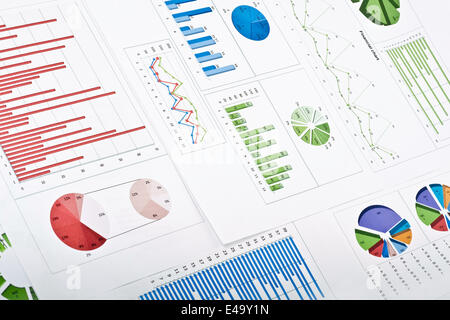 Stock Chart Papers Financial paper with charts and diagrams on gray table Stock Photo - Alamy