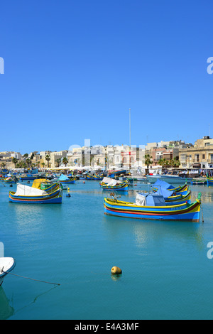 Luzzu boats in Marsaxlokk Harbour, Marsaxlokk, South Eastern District, Malta Xlokk Region, Republic of Malta Stock Photo