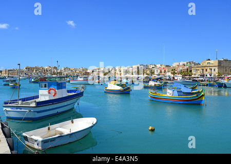 Luzzu boats in Marsaxlokk Harbour, Marsaxlokk, South Eastern District, Malta Xlokk Region, Republic of Malta Stock Photo