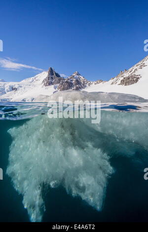 Above and below view of glacial ice in Orne Harbor, Antarctica, Polar Regions Stock Photo