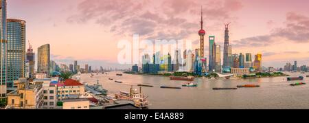 Pudong skyline across Huangpu River, including Oriental Pearl Tower, Shanghai World Financial Center, Shanghai, China Stock Photo