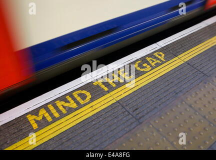 MIND THE GAP sign on platform edge, London Underground, London, England, United Kingdom, Europe Stock Photo