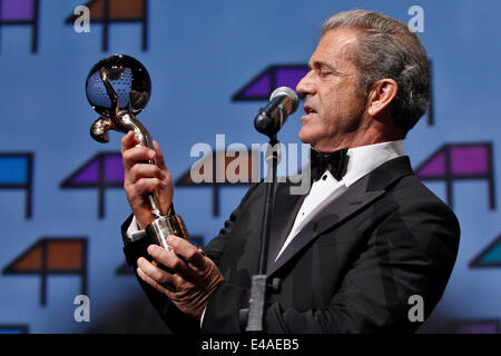 Hollywood actor, director and producer Mel Gibson holds the Crystal Globe for Outstanding Artistic Contribution to World Cinema at the opening of the 49th Karlovy Vary International Film Festival in Karlovy Vary, west Bohemia, on Friday, July 4, 2014. (CTK Photo/Pavel Nemecek) Stock Photo