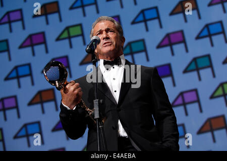 Hollywood actor, director and producer Mel Gibson holds the Crystal Globe for Outstanding Artistic Contribution to World Cinema at the opening of the 49th Karlovy Vary International Film Festival in Karlovy Vary, west Bohemia, on Friday, July 4, 2014. (CTK Photo/Pavel Nemecek) Stock Photo