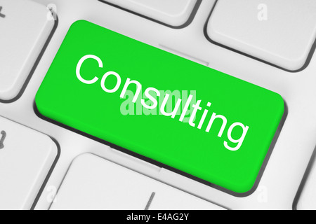 Green consulting button on white keyboard Stock Photo