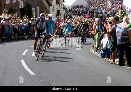 Finchingfield, Essex, UK. 07th July, 2014. The Tour de France stage from Cambridge to London runs through the picturesque Essex village of Finchingfield.  Cyclists climb the hill on Wethersfield Road. Credit:  William Edwards/Alamy Live News Stock Photo