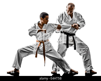 two karate men sensei and teenager student teacher teaching isolated on white background Stock Photo