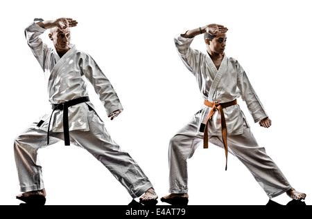 two karate men sensei and teenager student teacher teaching isolated on white background Stock Photo