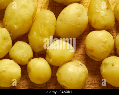 peeled boiled yellow baby potatoes Stock Photo - Alamy