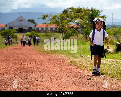 Pemon girl of Kamarata community returnin from school. Bolívar state. Venezuela. Stock Photo