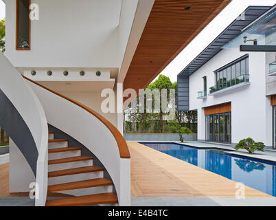 Peirce Hill Private House, Singapore, Singapore. Architect: Kay Ngee Tan Architects, 2014. Spiral staircase leading to first flo Stock Photo