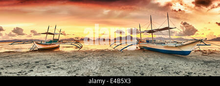 Boats at sunset Stock Photo