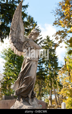 Monument to an angel on a cemetery Stock Photo