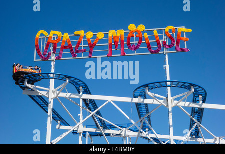 Seafront Fun-fair rides on 'Crazy Mouse' at Weston-super-mare, Somerset, England, UK Stock Photo