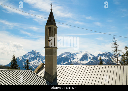 Bell tower of small Alpine church in the Susa Valley, Italy. Stock Photo