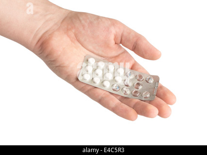 Pills in hand, on white background isolate Stock Photo