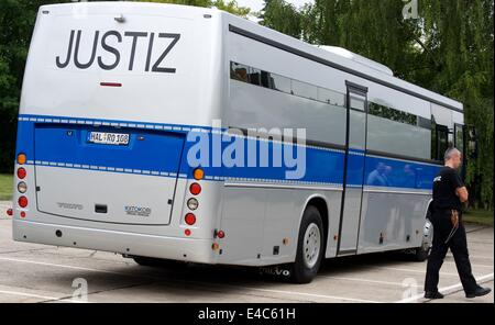 The new bus for prisoner transports leaves the grounds of prison JVA Halle in Halle/Saale, Germany, 08 July 2014. The new bus was refitted for prisoner transports by a Finnish company after a Europe-wide call for bids. The bus provides enough space for 28 prisoners. Photo: PETER ENDIG/DPA Stock Photo