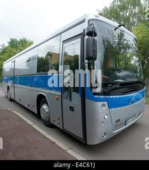 The new bus for prisoner transports leaves the grounds of prison JVA Halle in Halle/Saale, Germany, 08 July 2014. The new bus was refitted for prisoner transports by a Finnish company after a Europe-wide call for bids. The bus provides enough space for 28 prisoners. Photo: PETER ENDIG/DPA Stock Photo