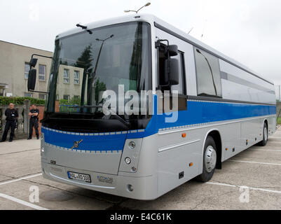 The new bus for prisoner transports leaves the grounds of prison JVA Halle in Halle/Saale, Germany, 08 July 2014. The new bus was refitted for prisoner transports by a Finnish company after a Europe-wide call for bids. The bus provides enough space for 28 prisoners. Photo: PETER ENDIG/DPA Stock Photo