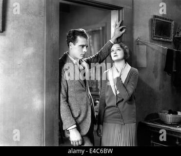 James Murray, Eleanor Boardman, on-set of the Silent Film, 'The Crowd', 1928 Stock Photo