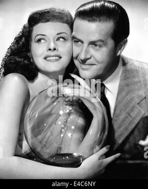 Paulette Goddard, Ray Milland, on-set of the Film, 'The Crystal Ball', 1943 Stock Photo