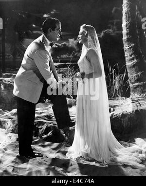 Fred MacMurray, Madeleine Carroll, on-set of the Film, 'Honeymoon in Bali', 1939 Stock Photo