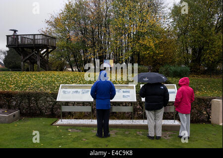 Visitors near the First Australian Division Memorial in Pozires looking at information panels that explain the battlefields Stock Photo
