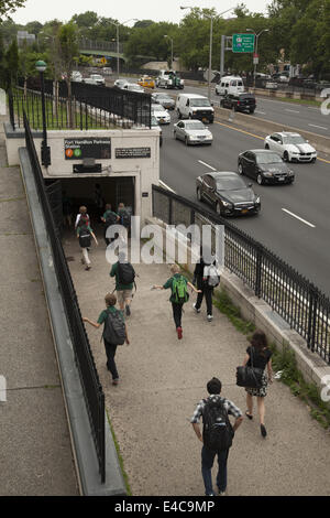 Students walk from nearby school to the Fort Hamilton stop on the F train in Windsor Terrace, Brooklyn, NY. Stock Photo