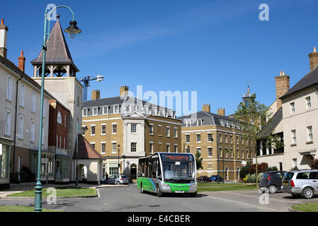 An electric bus in the Poundbury estate, Dorchester, Dorset. Stock Photo