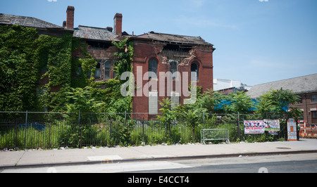 The heavily damaged Flatbush District No. 1 School at the intersection of Church and Bedford Avenues in Flatbush in Brooklyn Stock Photo