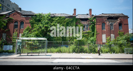 The heavily damaged Flatbush District No. 1 School at the intersection of Church and Bedford Avenues in Flatbush in Brooklyn Stock Photo