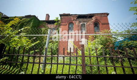 The heavily damaged Flatbush District No. 1 School at the intersection of Church and Bedford Avenues in Flatbush in Brooklyn Stock Photo