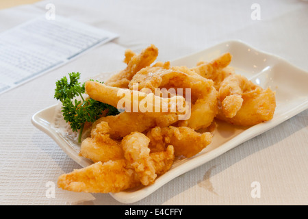 Fried calamari, Dim Sum in a Chinese restaurant, Soho, London, England, UK Stock Photo