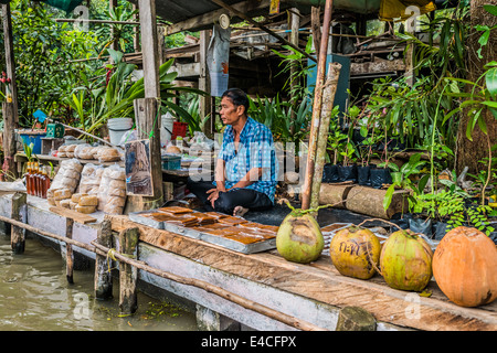 Bangkok, Thailand - December 30, 2013: seller at Amphawa Bangkok floating market at Bangkok, Thailand on december 30th, 2013 Stock Photo