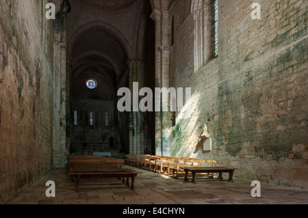 Interior of the fortified Romanesque abbey church in the medieval village Saint-Amand-de-Coly, Dordogne, Périgord, France Stock Photo