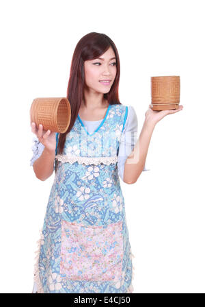 female chef with bamboo rice box isolated on white background Stock Photo