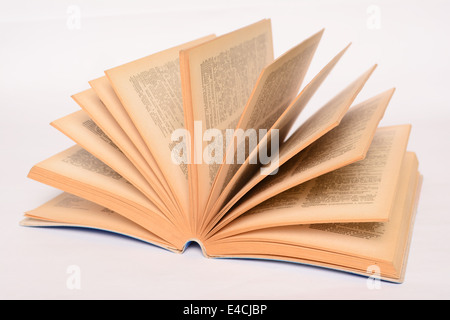 Old open book on white background Stock Photo