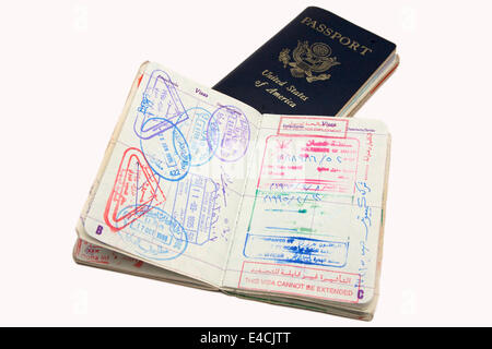 American passport open to revel travel visas and stamps from Arabian Peninsula countries. Stock Photo